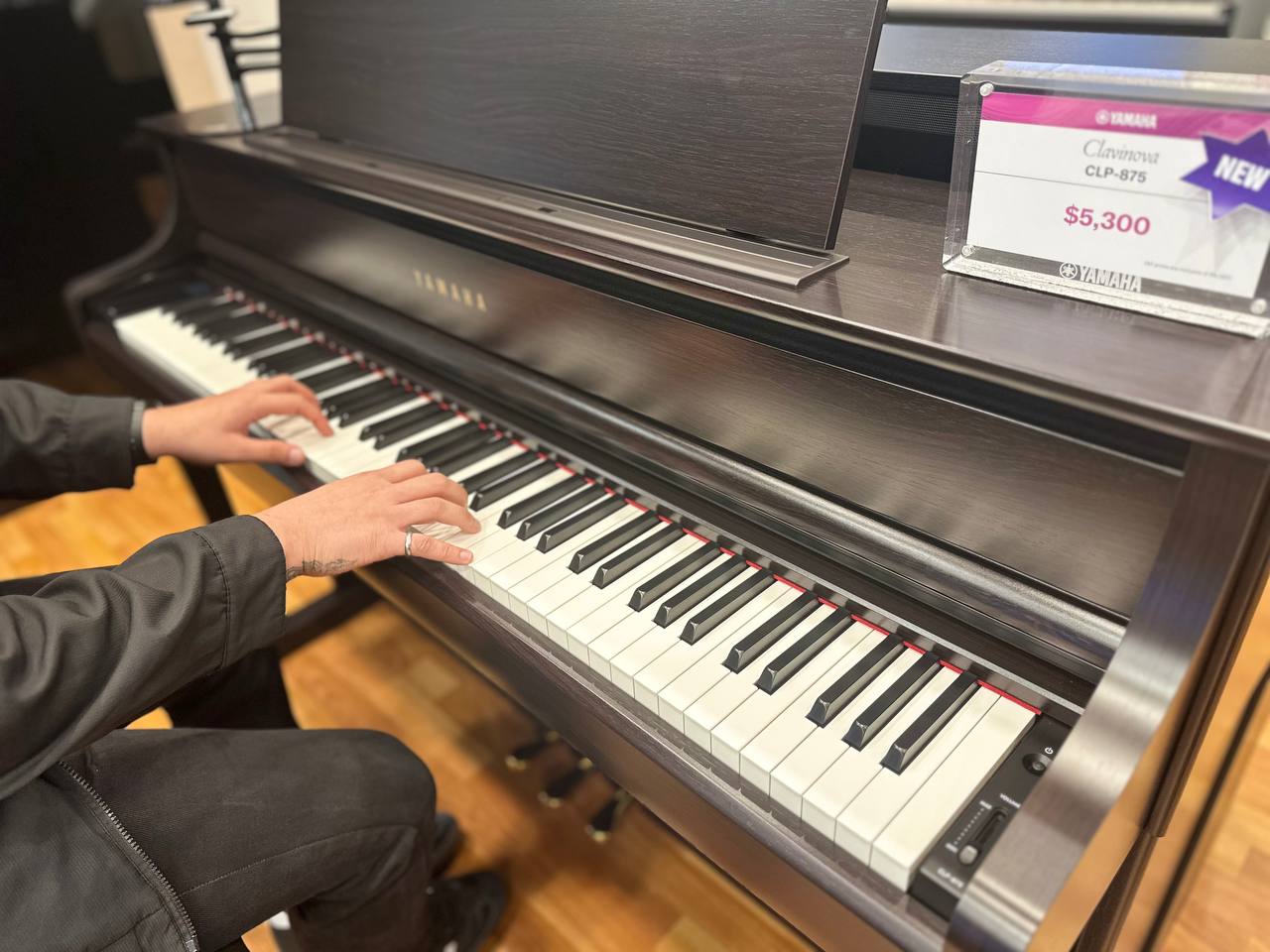 A Piano Learner Playing on the Yamaha Clavinova Digital Piano